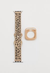 Leopard-print silicone watch band in tan with black spots, featuring a silver hardware clasp. Accompanied by a matching tan protective case.