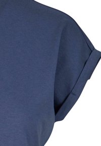 Tricou scurt cu mânecă scurtă, de culoare bleumarin, cu un croi lejer, având o textură netedă și manșete răsucite. Fără modele vizibile sau detalii din metal.