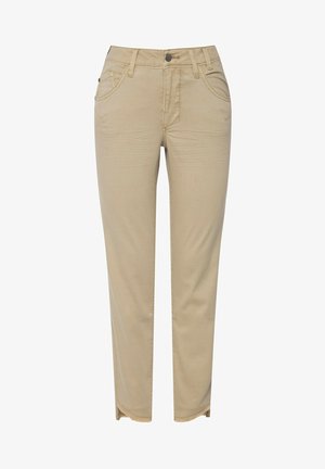 Pantaloni in cotone beige con taglio aderente, orlo leggermente sfilacciato e design tradizionale a cinque tasche. Presentano una chiusura con zip e bottone.