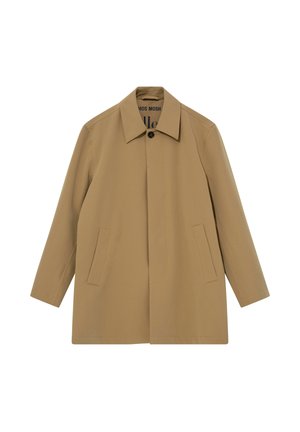 Bež kaput dužine do koljena s špicastim ovratnikom, skrivenim prednjim gumbima i dva prednja urezana džepa, izrađen od glatke tkanine.