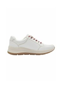 White athletic shoes with a smooth leather upper, tan sole, red and blue accents on laces, and contrasting stitching on the sides.