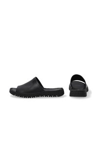 Black slide sandals with a smooth upper, open back, and textured rubber sole. Features a wide, rounded toe strap for a relaxed fit.