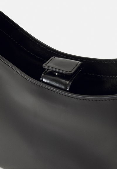 Filippa K SMALL SHOULDER BAG - Bolso de mano - black