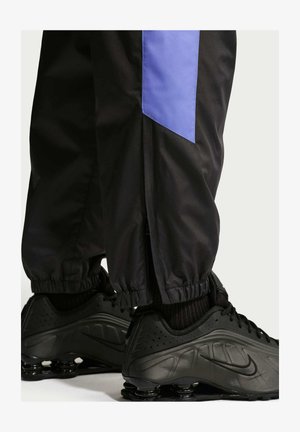 Nike Sportswear, M NK WR LND PANT 26 - Trainingsbroek - black sapphire sapphire