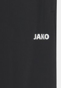 JAKO Jogginghose - schwarz/weiß