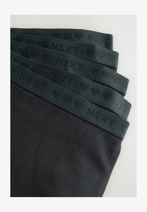 Sorte leggings med en mørkegrøn elastisk talje. Taljen har prægede tekster og hjerte mønstre. Blød, glat tekstur.