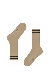 Calze beige con texture a coste, con due strisce scure nella parte superiore. Stampate con il nome del marchio "FALKE" e la taglia "39-42" sulla suola.
