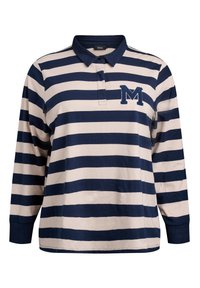 Tumesinist ja kreemjast triibuline pika varrukaga polo särk, millel on krae ja vasakul rinnal jäädvustatud kiri "M". Puuvillane kangas.