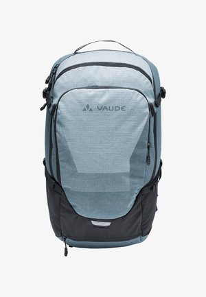 Sac à dos bleu clair avec un dessus texturé, un bas noir, des bretelles réglables, plusieurs compartiments zippés et du branding à l'avant.