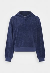 Marineblauwe cropped hoodie van zacht, textuur materiaal, voorzien van een trekkoord capuchon en lange, aansluitende mouwen met geribde cuffs.