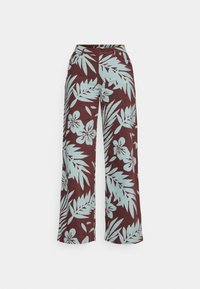 Pantalon à jambes larges avec une base marron et un imprimé floral et feuilles tropicales bleu clair, doté de poches avant et d'une fermeture à boutons.
