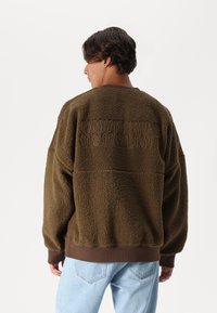 Carhartt WIP COORDINATE  - Suéter de forro polar - chocolate/brown