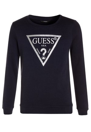 Marineblauwe sweatshirt met lange mouwen, ronde halslijn en een zilveren driehoeklogo met de tekst "GUESS U.S.A. WASHED JEANS."