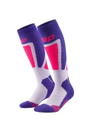 Calze compressive con un design viola e bianco, con accenti rosa e un motivo geometrico, realizzate in un mix di materiali traspiranti.