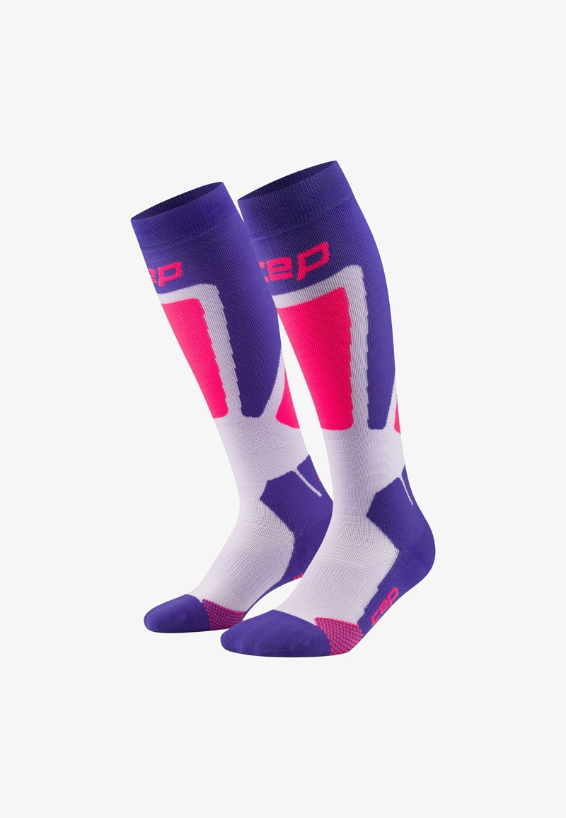 Calze compressive con un design viola e bianco, con accenti rosa e un motivo geometrico, realizzate in un mix di materiali traspiranti.