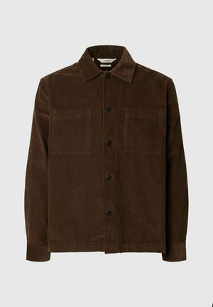 Brown corduroy button-up shirt with two chest pockets and a classic collar, displayed on a neutral background.