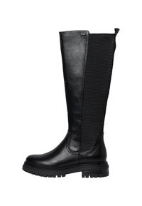 Botte noire mi-mollet avec l'avant en cuir lisse, arrière en maille texturée, semelle à crampons et languette de traction en haut à l'arrière.