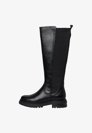 Botte noire mi-mollet avec l'avant en cuir lisse, arrière en maille texturée, semelle à crampons et languette de traction en haut à l'arrière.