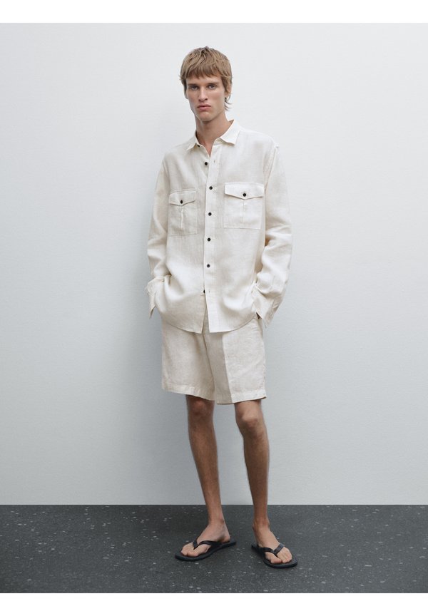 BERMUDA - Shorts - beige