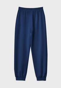 Navyblaue Sweatpants aus glattem Stoff, mit elastischem Bund und schmal zulaufenden Bündchen am Knöchel, die eine entspannte Passform bieten.
