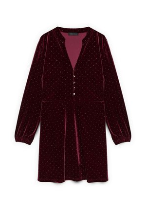 Abito di velluto borgogna con maniche lunghe, chiusura frontale a bottoni e motivo a pois argento. Presenta un scollo a V e polsini delle maniche arricciati.