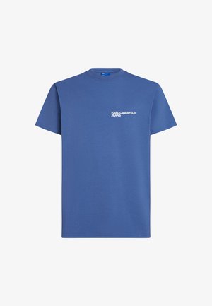 Blå bomulds T-shirt med rund hals, korte ærmer og et hvidt "KARL LAGERFELD JEANS" logo trykt på venstre brystområde.