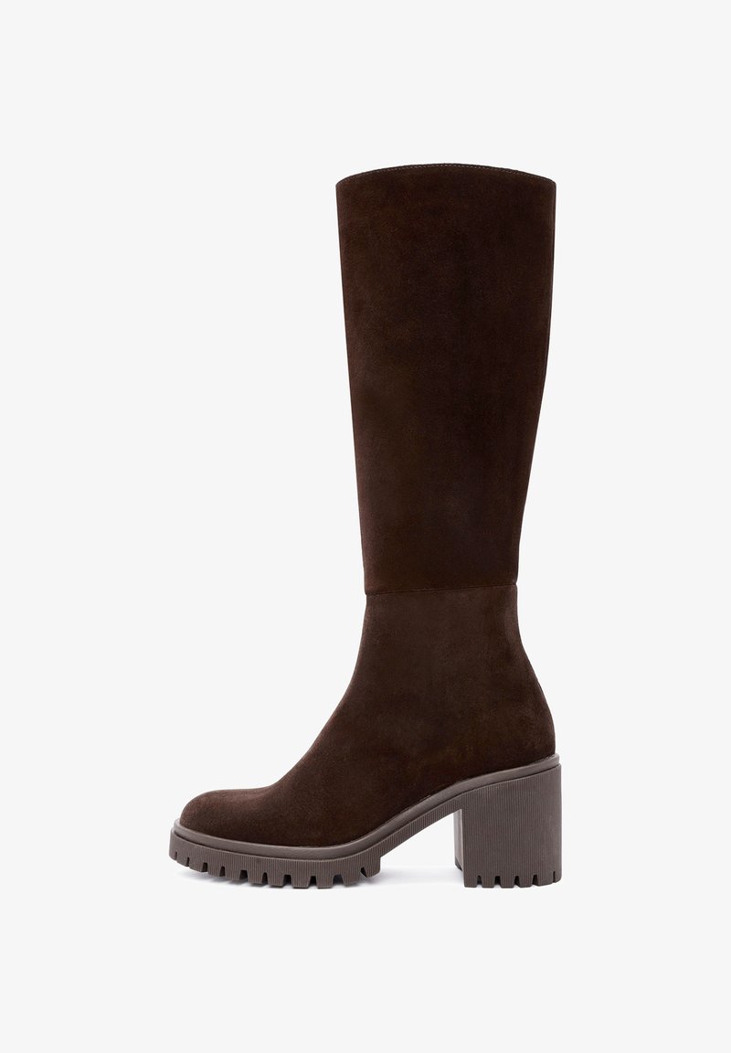 Brown suede knee-high boot with a rubber sole, chunky heel, and textured detailing on the bottom for grip. Smooth, matte finish.