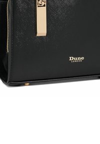 Zwarte Dune London-handtas met een textuur oppervlak, gouden hardware, vierkante logo-accent en gouden pootjes. Elegante ontwerp met een ritssluiting.