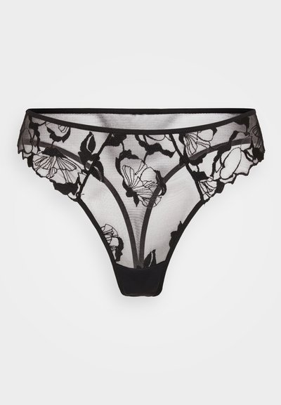 Black lace thong with floral embroidery, featuring a sheer panel and scalloped edges. Soft fabric and minimal coverage design.