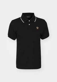 Polo shirt noir avec accents de col blanc et finitions de manches. Présente un petit emblème doré de marque sur la poitrine. Tissu en coton, coupe classique.