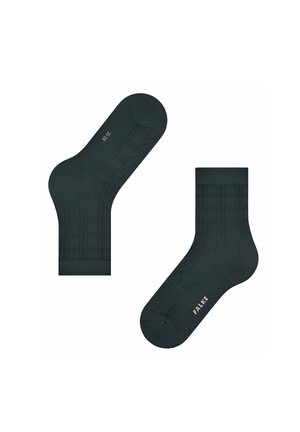 Dunkelgrüne Socken mit einem gerippten Muster, einer glatten Textur, verstärktem Fersen- und Zehenbereich sowie geprägtem "FALKE"-Logo.