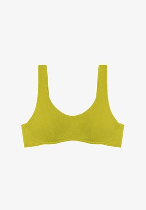 Żółty biustonosz o błyszczącej teksturze, szerokich ramiączkach i zaokrąglonym dekolcie. Prosty, bezszwowy design bez ozdób.