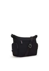 Sort crossbody taske med justerbar rem, frontlomme med lynlås og to sidelommer med lynlås, vist på hvid baggrund.