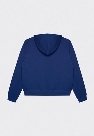 Granatowy, kapturowy sweter z teksturowanej tkaniny, ze ściągaczami przy mankietach i skróconym krojem. Posiada duży, zaokrąglony kaptur z tyłu.