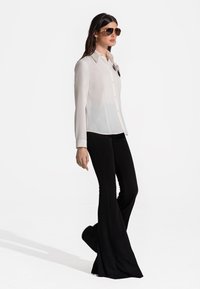 SAX35TH by Alicja Czarniecka WIDE - Hlače - black