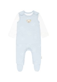 Helles blauer Baumwollbabyoverall mit langen Ärmeln, ausgestattet mit einem Bären-Applikation und Elefantenmotiven. Druckknopfverschlüsse an Schultern und Beinen.