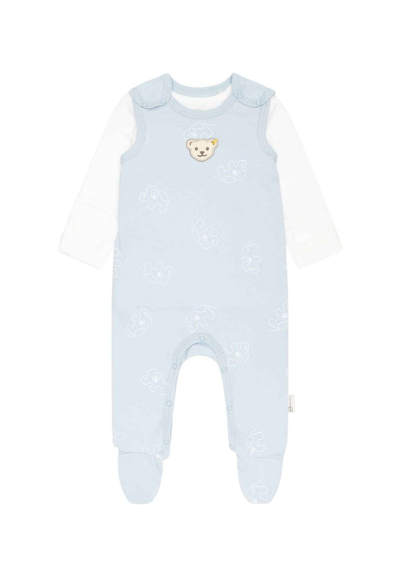 Helles blauer Baumwollbabyoverall mit langen Ärmeln, ausgestattet mit einem Bären-Applikation und Elefantenmotiven. Druckknopfverschlüsse an Schultern und Beinen.