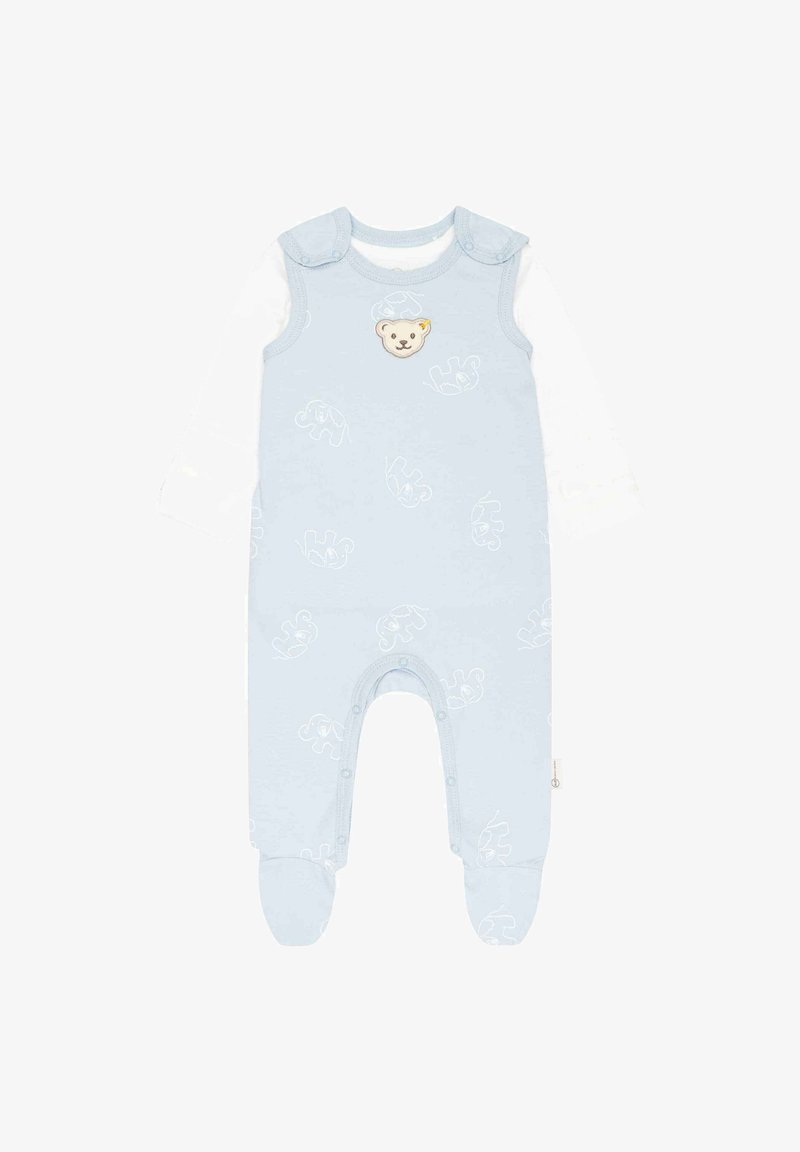 Helles blauer Baumwollbabyoverall mit langen Ärmeln, ausgestattet mit einem Bären-Applikation und Elefantenmotiven. Druckknopfverschlüsse an Schultern und Beinen.