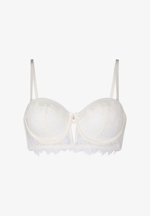 Witte kanten balconette beha met dunne verstelbare bandjes, een kleine strik en een sleutelgat uitsnede middenvoor, en geschulpte kanten rand onderaan.