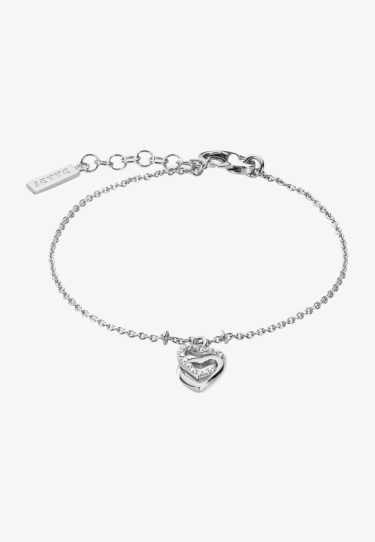 Bracciale in argento con un charm a forma di cuore doppio con finitura testurizzata e strass incastonati, collegato con una catena fine. Inclusa etichetta con logo JETTE.