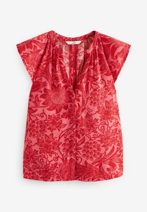 Czerwona kwiatowa bluzka z krótkim rękawem, dekoltem w serek i zapinana na guziki z przodu, z mieszanką dużych kwiatów i wzorów liści.