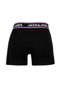 Boxeur en coton noir avec une large ceinture portant "JACK & JONES" en texte blanc et un accent rose. Texture lisse, design ajusté.
