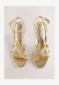 Sélectionné, gold-couloured