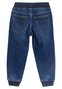 Jogger in denim blu scuro con vita a coste e gambe affusolate; presenta due tasche posteriori e dettagli di cucitura in evidenza.