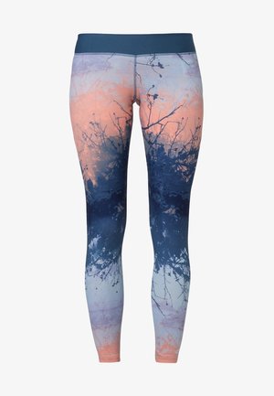 Leggings imprimés avec un dégradé de bleu à rose, ornés d'un motif de feuilles et de branches. Fabriqués en tissu extensible avec une ceinture sans coutures.
