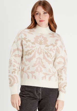 Maglione lavorato a maglia color crema con motivo floreale rosa e oro. Presenta un collo alto a coste e una vestibilità ampia con polsini e orlo a coste.