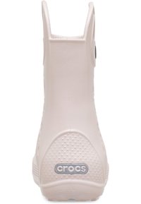 Różowy gumowy botek za kostkę z teksturowaną powierzchnią, zaokrąglonym tyłem i okrągłym logo; posiada pętelkę ułatwiającą zakładanie.