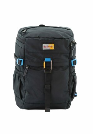 Black backpack with padded texture, adjustable blue straps, front buckle closure, and side pockets. Features a yellow logo patch.
