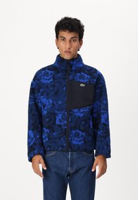 Lacoste Mezisezónní bunda  - globe/navy blue/lazuli
