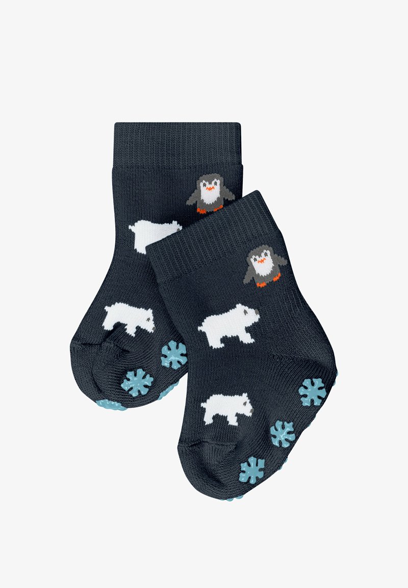 Granatowe skarpetki z białym wzorem niedźwiedzia polarnego i szarymi pingwinami, z silikonowymi uchwytami w kształcie płatków śniegu na podeszwach dla lepszej przyczepności.